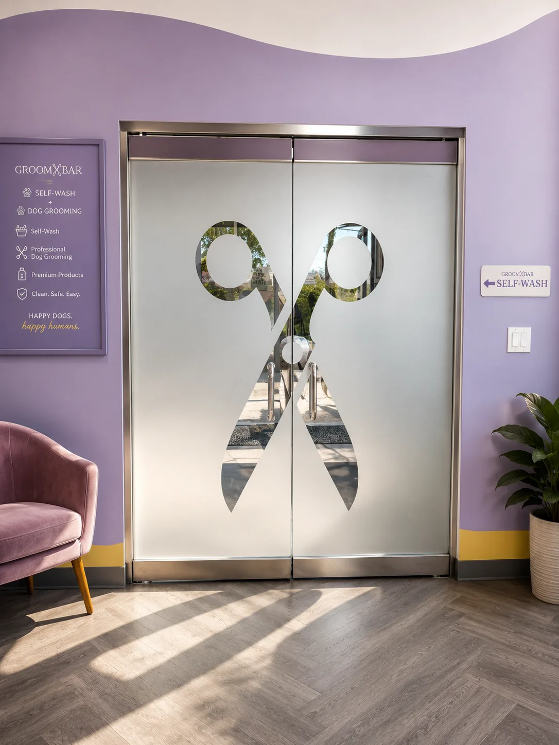 Frosted glass entry doors with the Groombar scissors logo cut-out